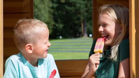 To kids enjoying ice cream